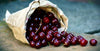 A bag of red cherries